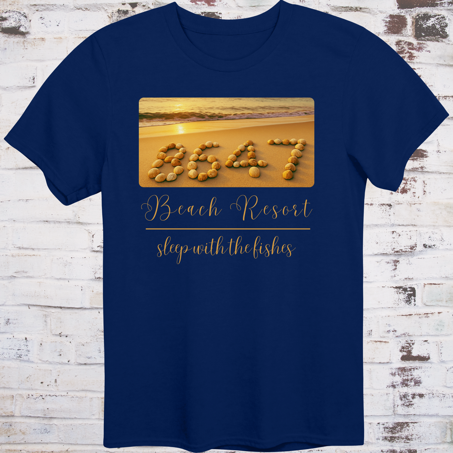Navy t-shirt featuring beach photo with “8647” spelled in seashells
and elegant text reading “Beach Resort – Sleep With the Fishes” –
anti-Trump parody shirt by Democratee’s