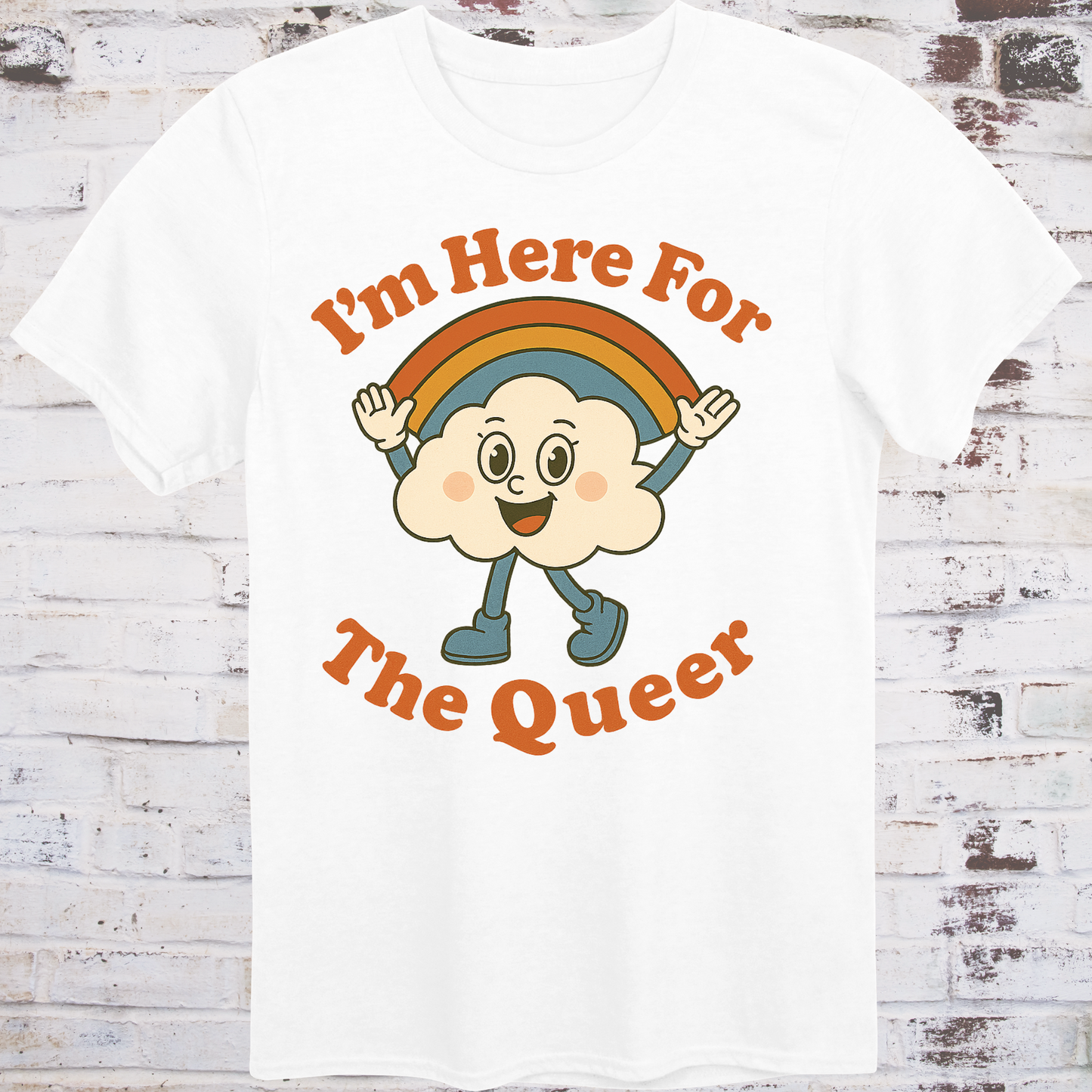 White t-shirt with retro-style cartoon cloud wearing boots and a rainbow,
surrounded by bold text reading "I’m Here for the Queer" –
inclusive pride shirt by Democratee’s