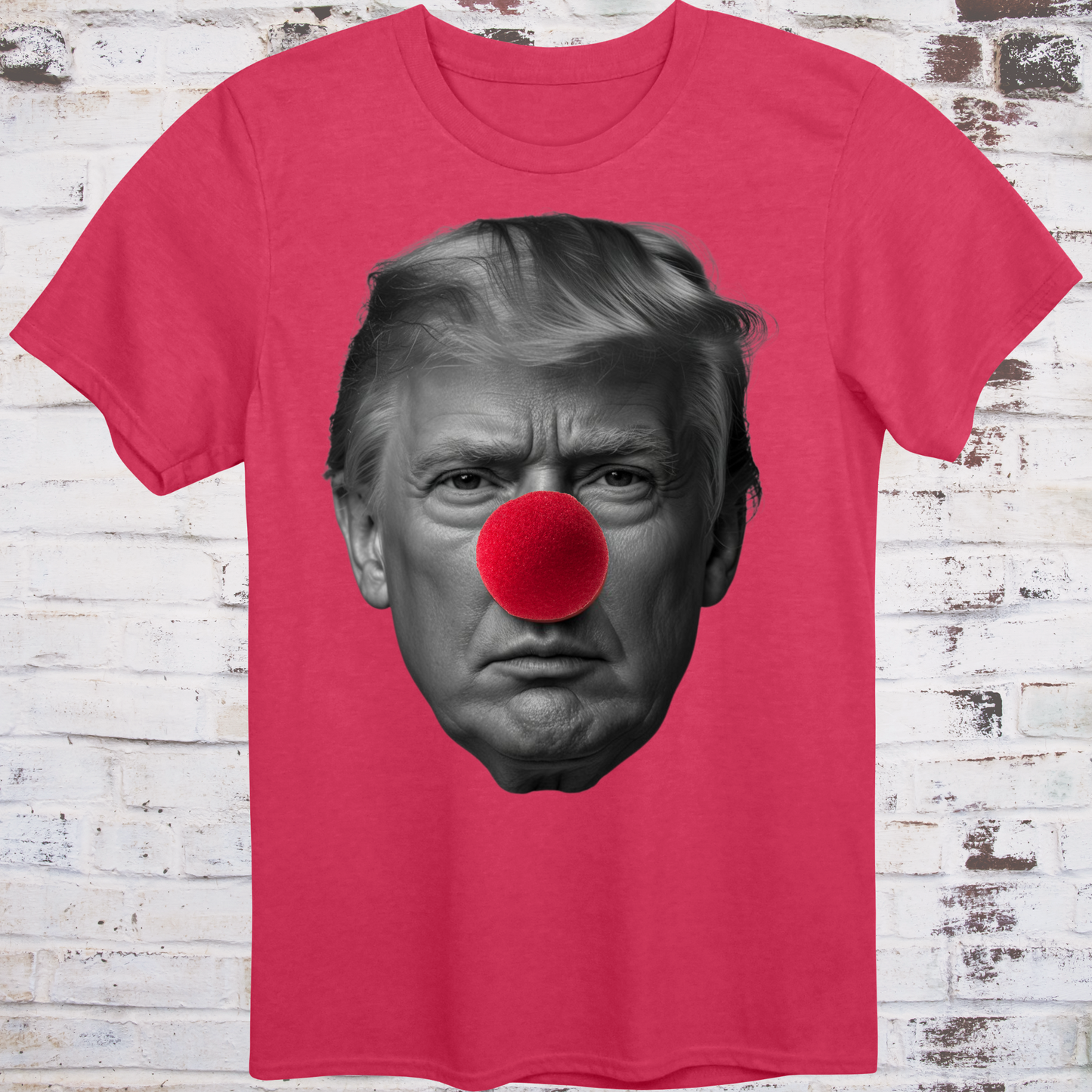Red t-shirt featuring a high-contrast black-and-white photo
of Donald Trump’s face with a large red clown nose –
minimalist parody protest shirt by Democratee’s