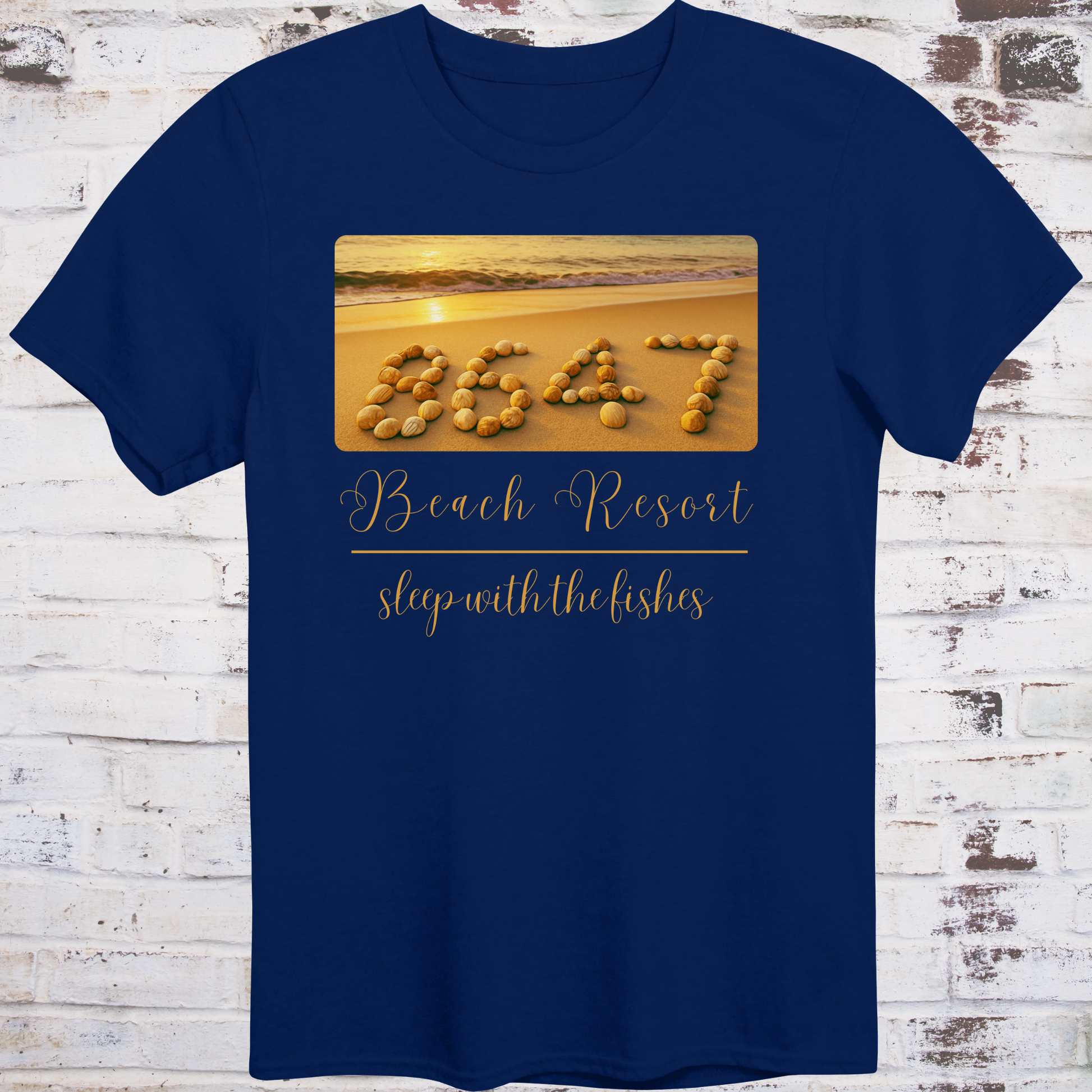 Navy t-shirt featuring beach photo with “8647” spelled in seashells  
and elegant text reading “Beach Resort – Sleep With the Fishes” –  
anti-Trump parody shirt by Democratee’s