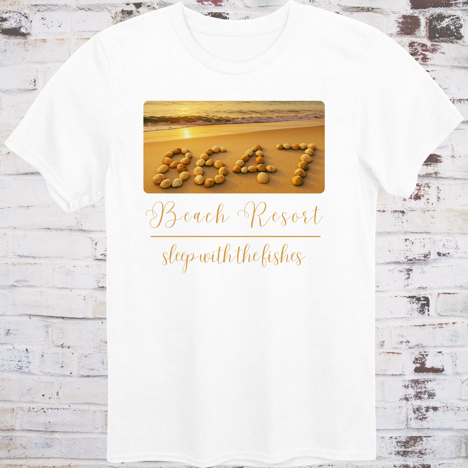 White t-shirt featuring beach photo with “8647” spelled in seashells  
and elegant text reading “Beach Resort – Sleep With the Fishes” –  
anti-Trump parody shirt by Democratee’s