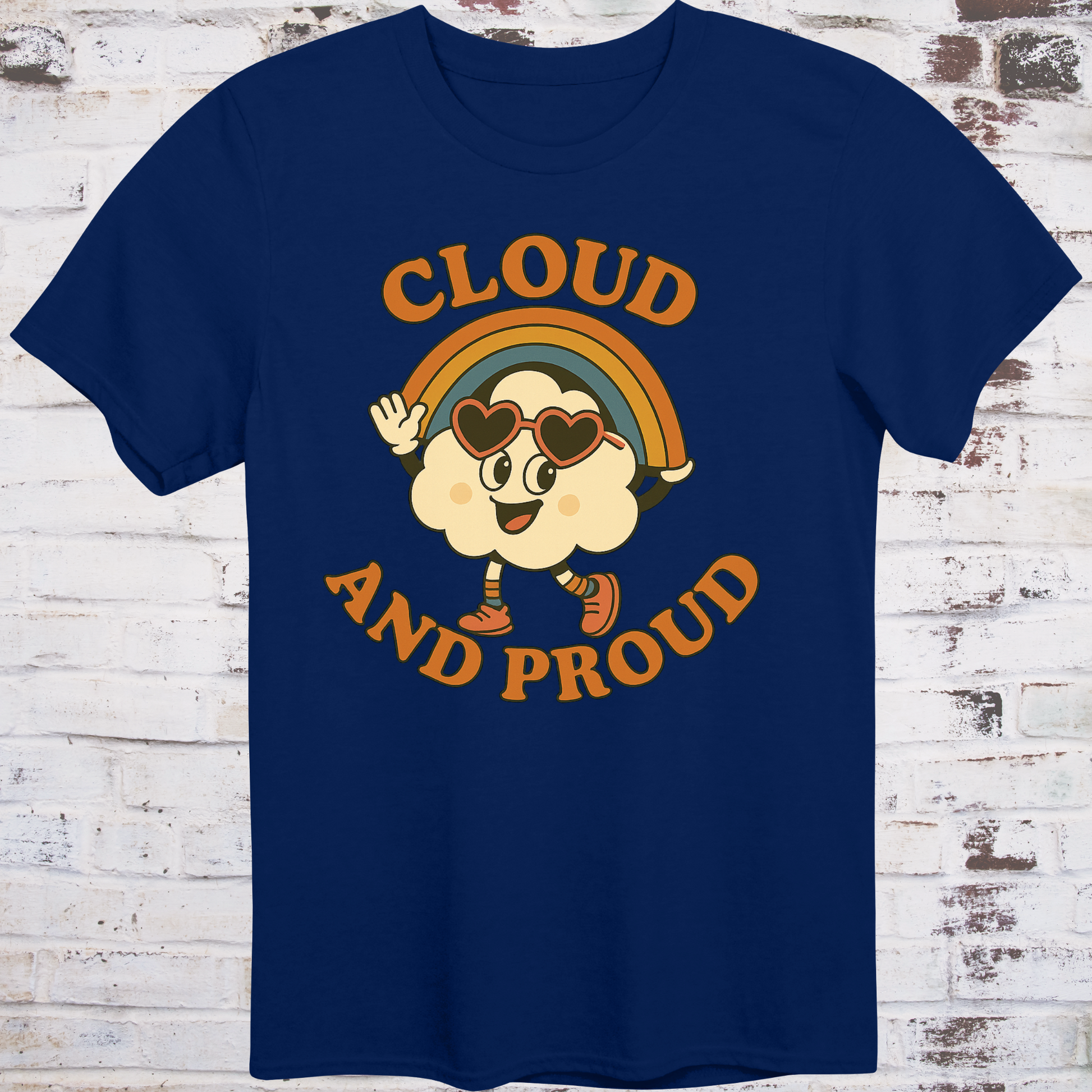 Navy t-shirt with cartoon cloud wearing heart sunglasses  
under a rainbow arch, with bold orange text reading "Cloud and Proud" –  
retro queer pride shirt by Democratee’s