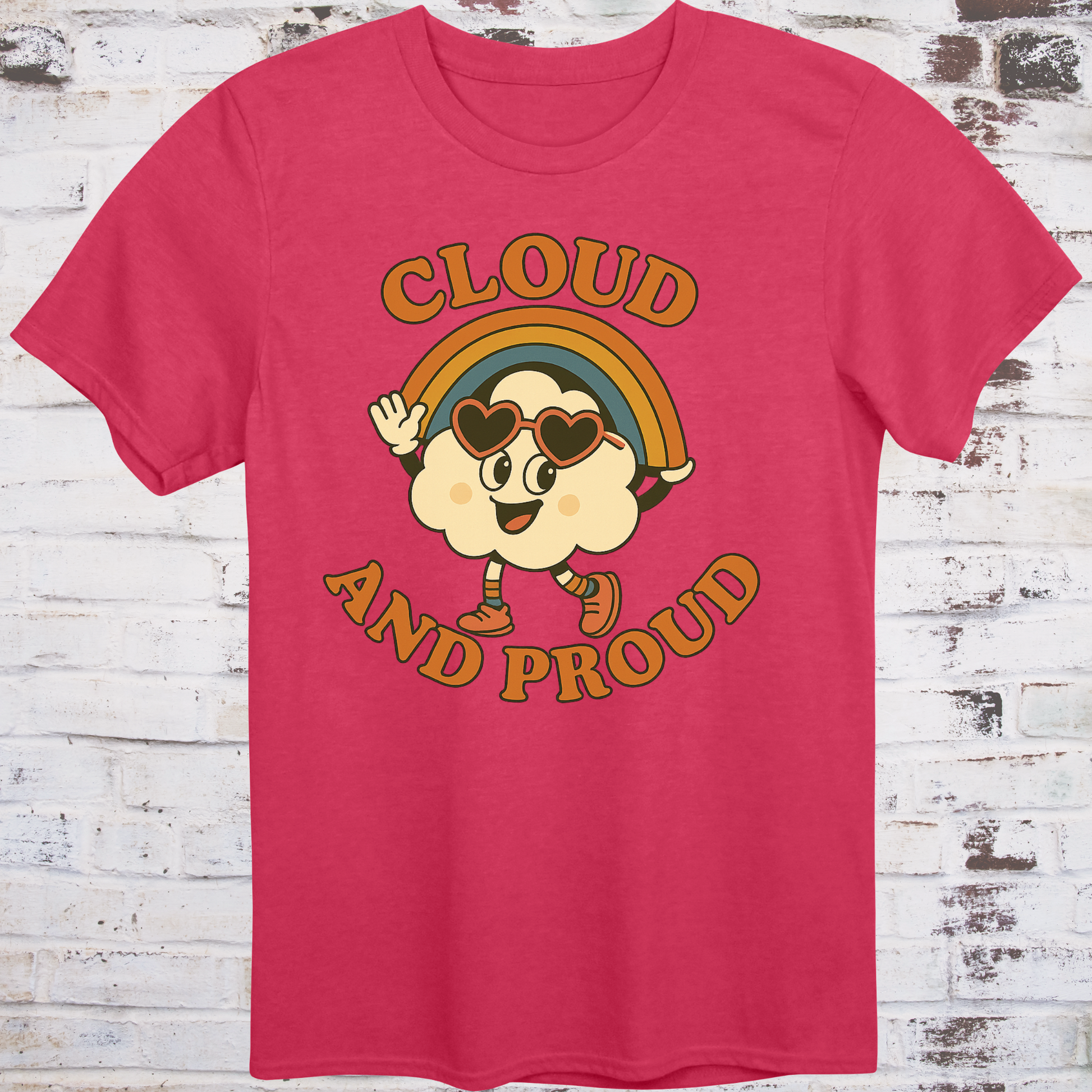 Red t-shirt with cartoon cloud wearing heart sunglasses  
under a rainbow arch, with bold orange text reading "Cloud and Proud" –  
retro queer pride shirt by Democratee’s