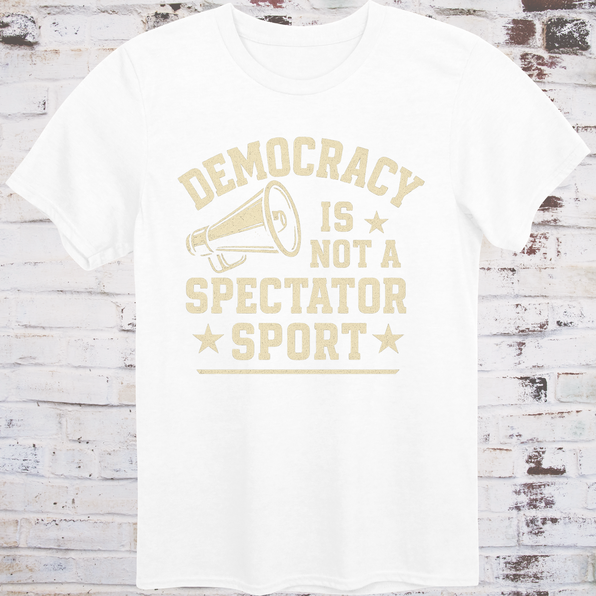 White t-shirt with vintage megaphone graphic and bold text reading  
"Democracy Is Not a Spectator Sport" – civic action apparel by Democratee’s
