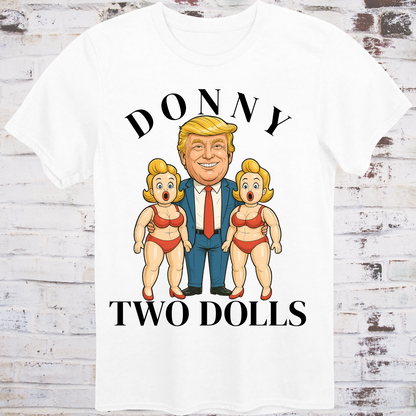 White t-shirt with cartoon of Donald Trump standing between  
two exaggerated blow-up dolls in red bikinis,  
with bold text reading "Donny Two Dolls" – parody protest shirt by Democratee’s