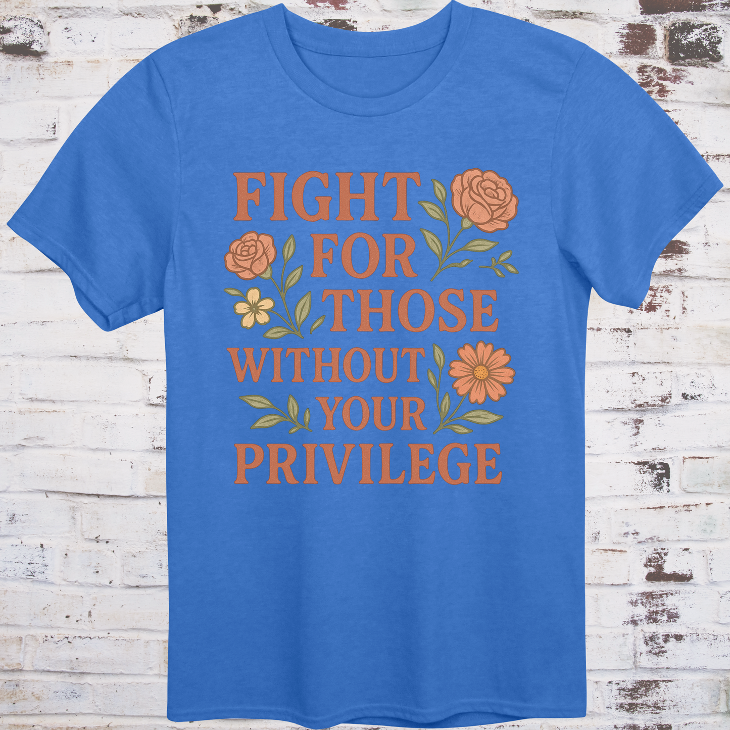 Blue t-shirt with vintage floral graphics surrounding bold text  
"Fight for Those Without Your Privilege" in warm terracotta tones –  
aesthetic protest shirt by Democratee’s