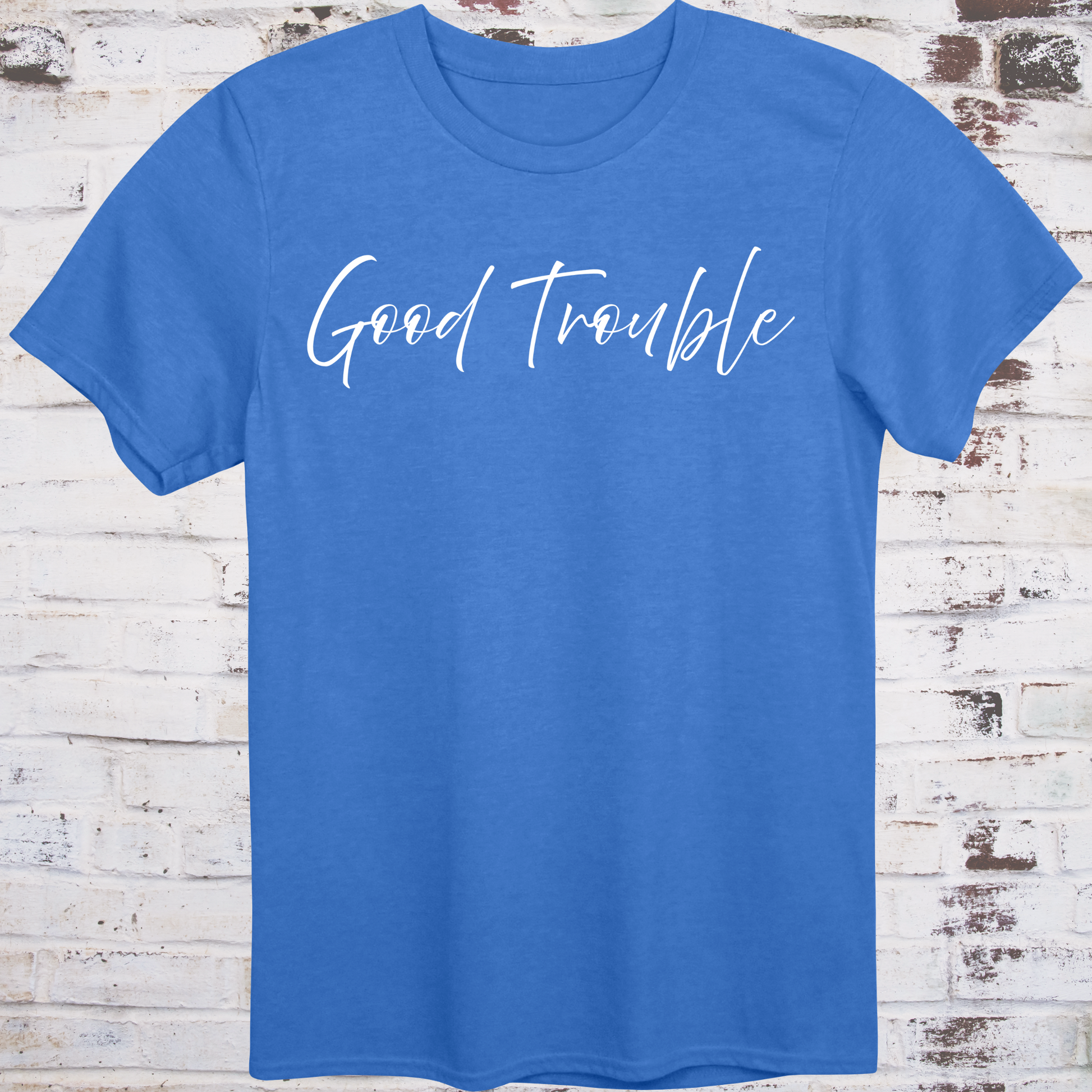Blue t-shirt with white handwritten script reading “Good Trouble” –  
minimalist civil rights tribute shirt by Democratee’s
