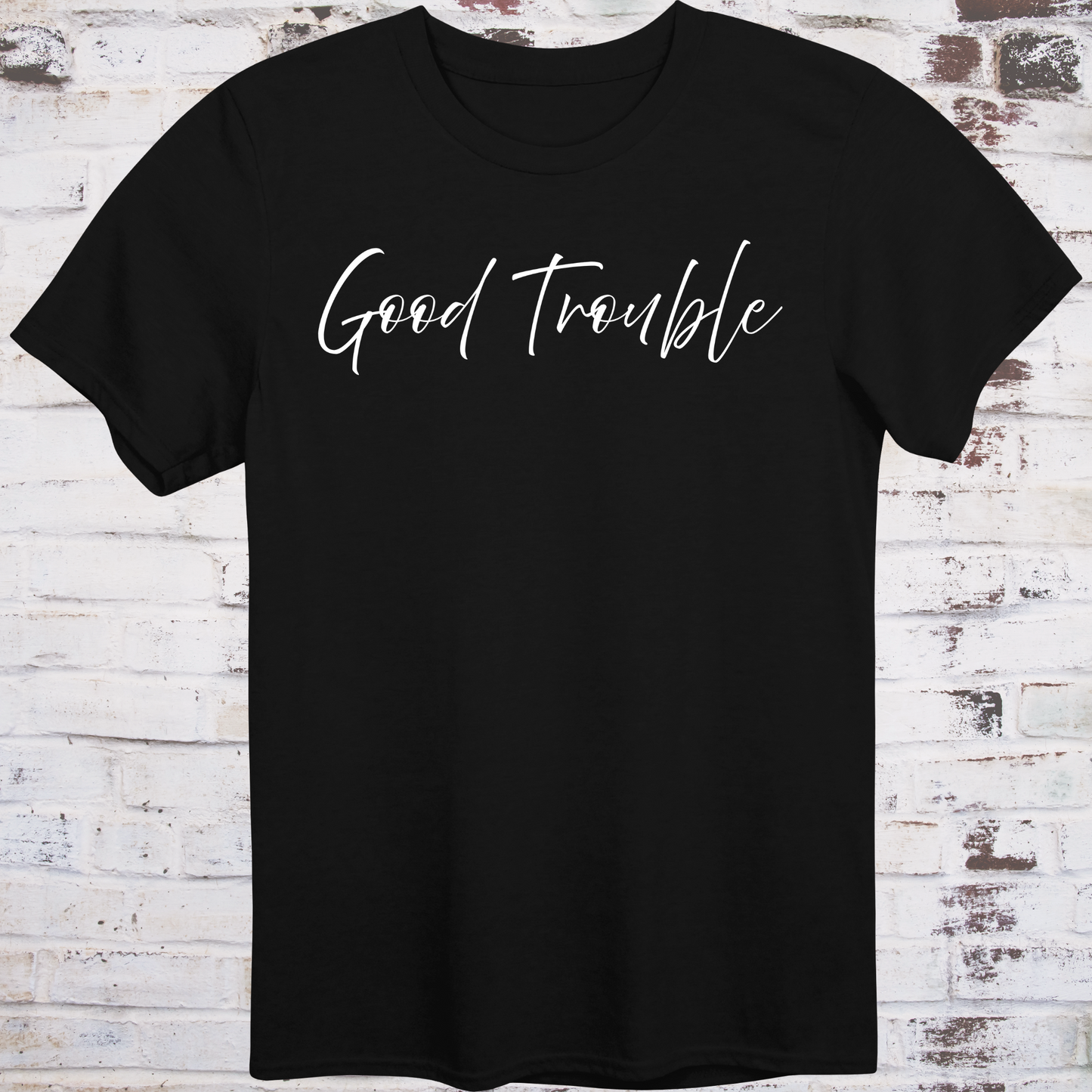 Black t-shirt with white handwritten script reading “Good Trouble” –  
minimalist civil rights tribute shirt by Democratee’s