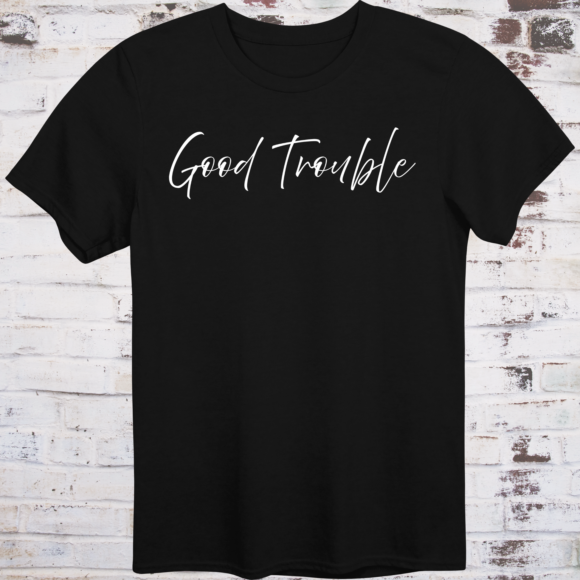 Black t-shirt with white handwritten script reading “Good Trouble” –  
minimalist civil rights tribute shirt by Democratee’s