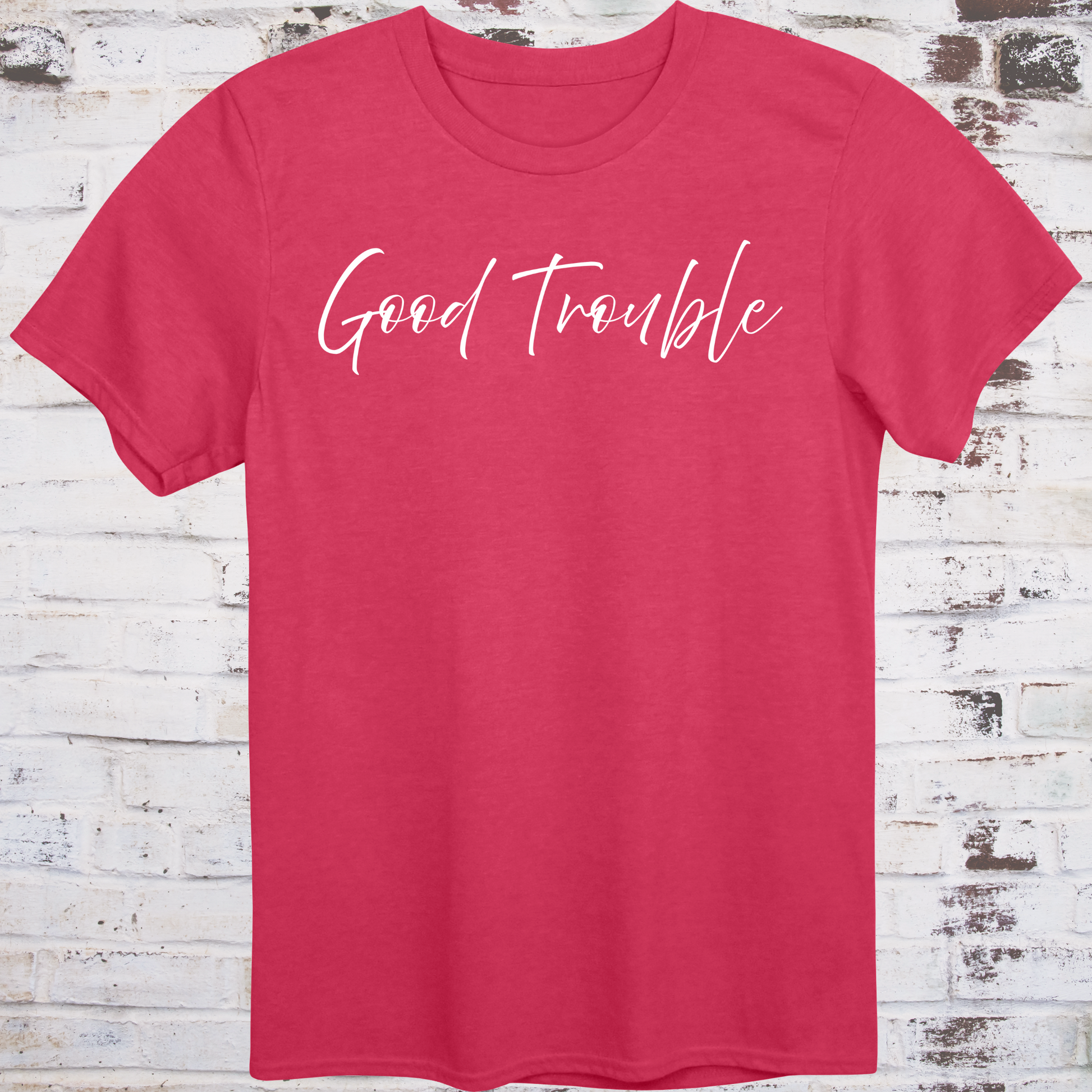 Red t-shirt with white handwritten script reading “Good Trouble” –  
minimalist civil rights tribute shirt by Democratee’s
