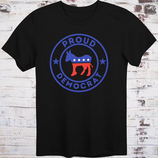 Black t-shirt with red, white, and blue donkey in a circular badge  
surrounded by stars and bold text reading “Proud Democrat” –  
classic political shirt by Democratee’s