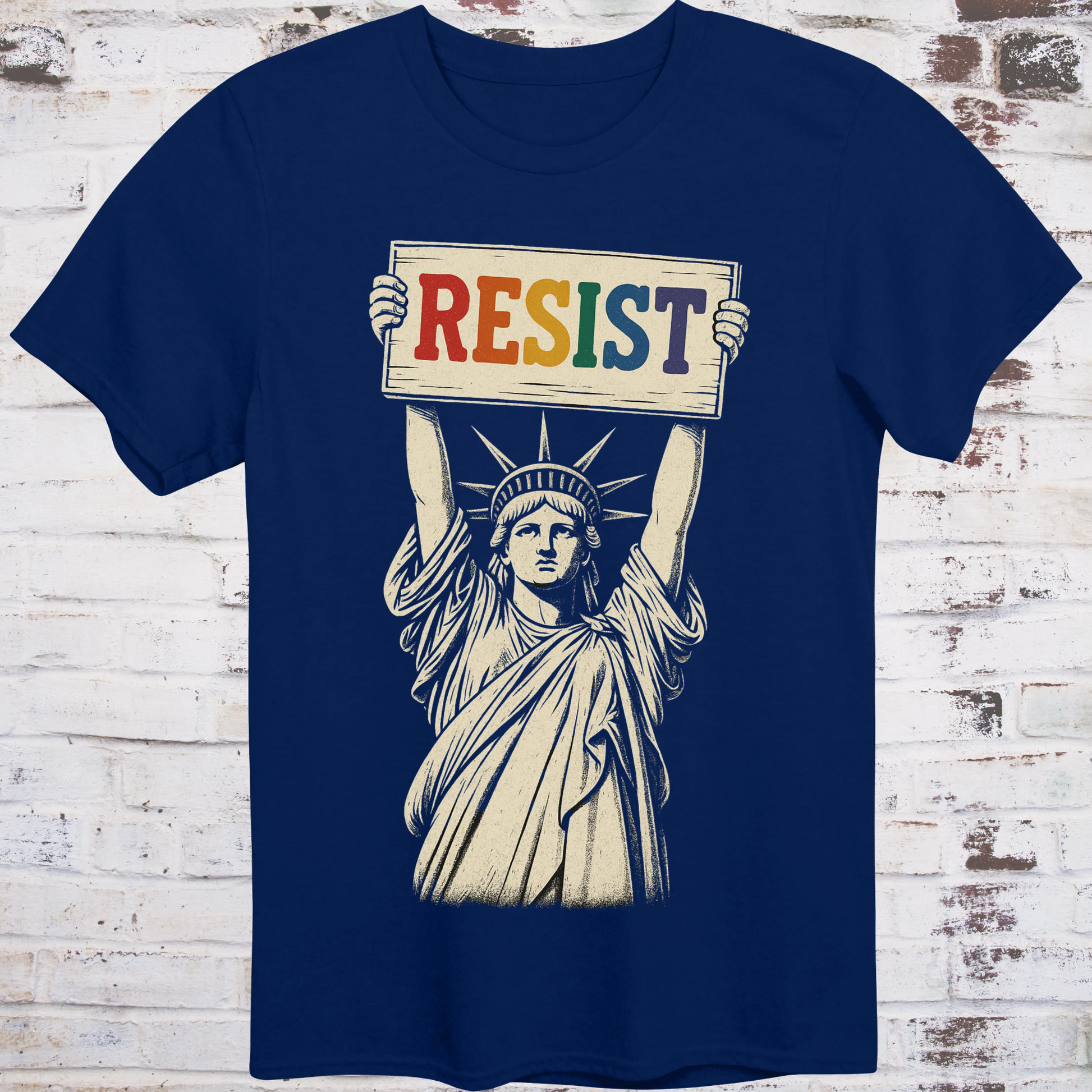 Navy t-shirt featuring vintage illustration of the Statue of Liberty  
holding a rainbow-colored "RESIST" sign –  
progressive pride protest shirt by Democratee’s