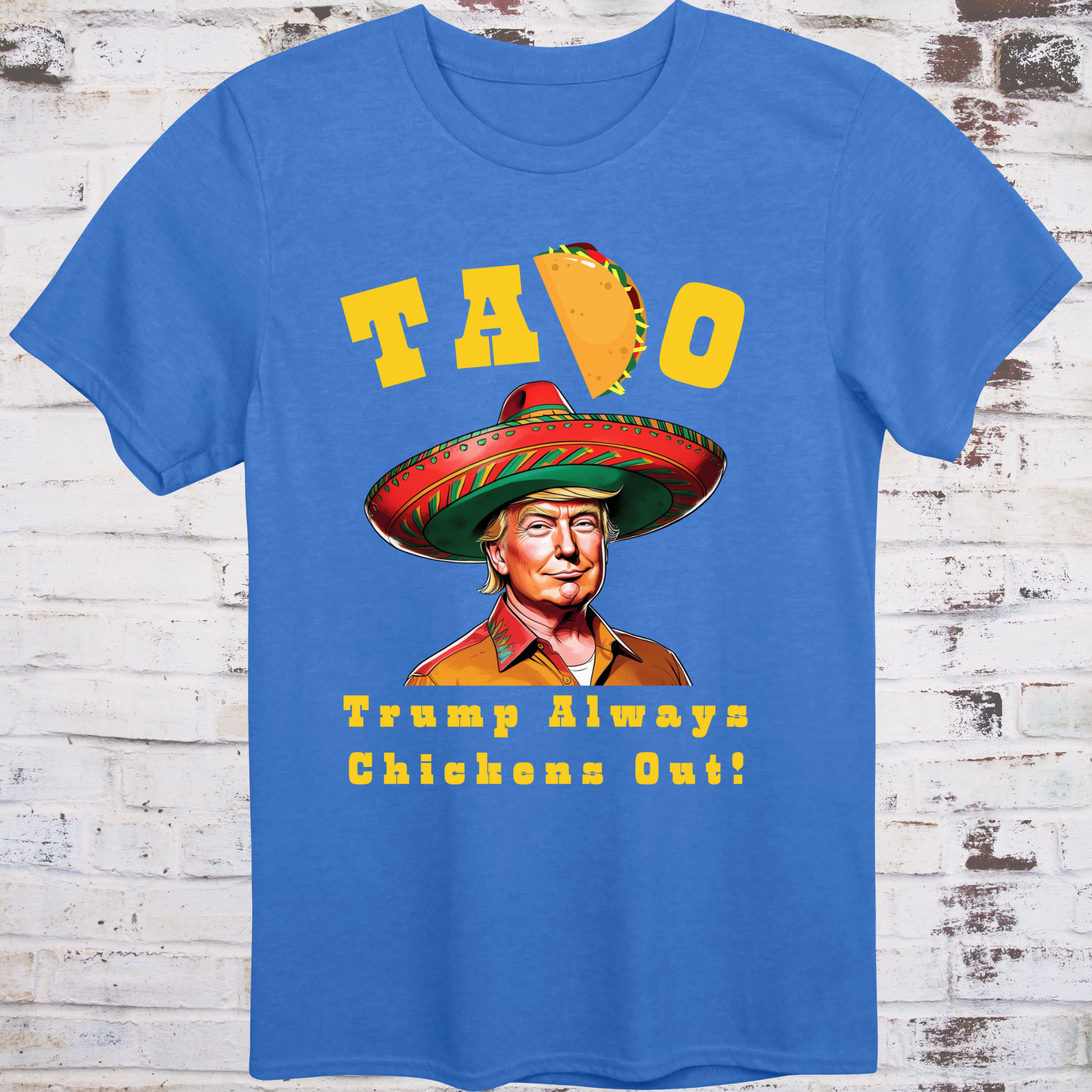 Blue t-shirt with cartoon image of Donald Trump in sombrero  
and yellow text reading “TACO – Trump Always Chickens Out!”  
with a taco replacing the “C” – political parody shirt by Democratee’s
