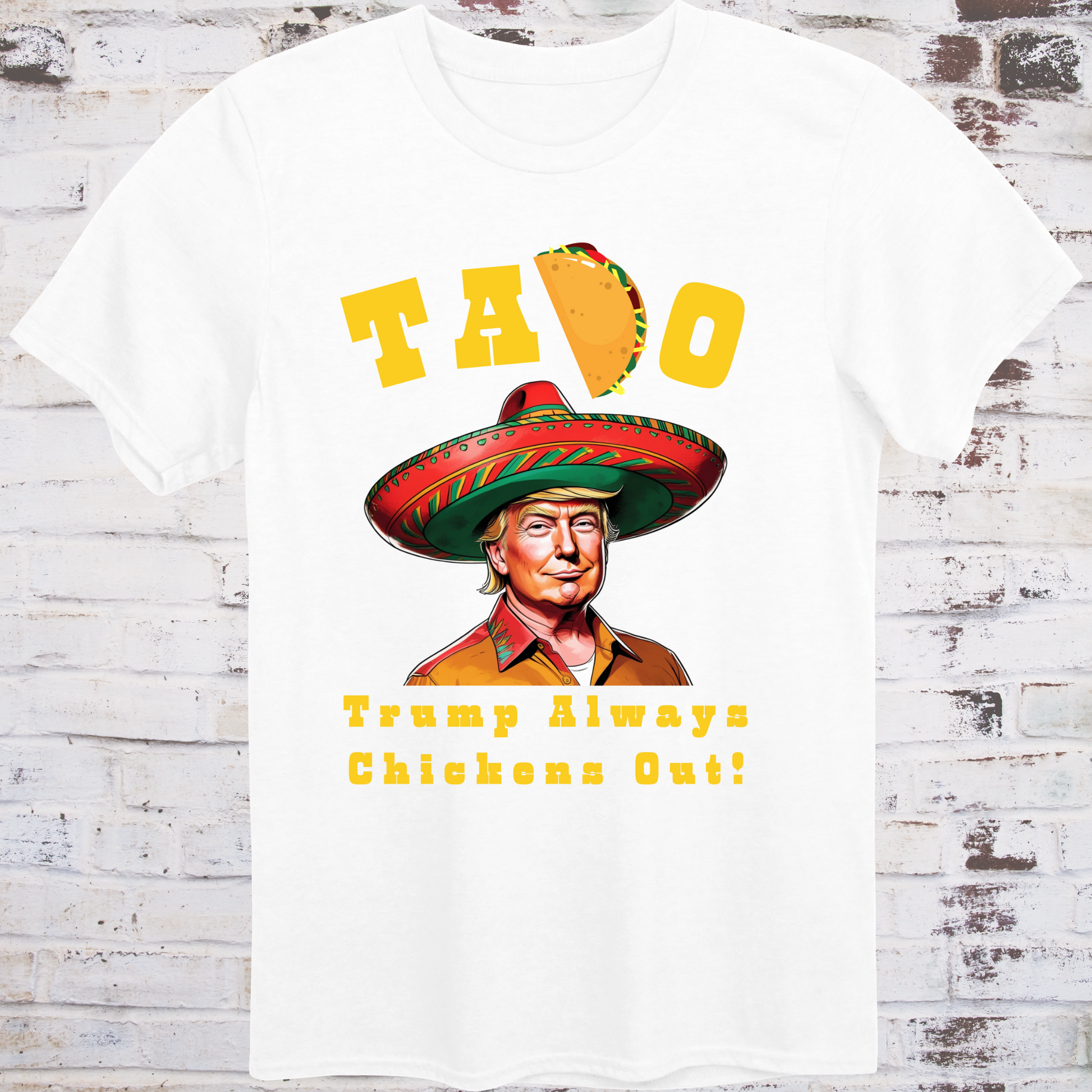 White t-shirt with cartoon image of Donald Trump in sombrero  
and yellow text reading “TACO – Trump Always Chickens Out!”  
with a taco replacing the “C” – political parody shirt by Democratee’s