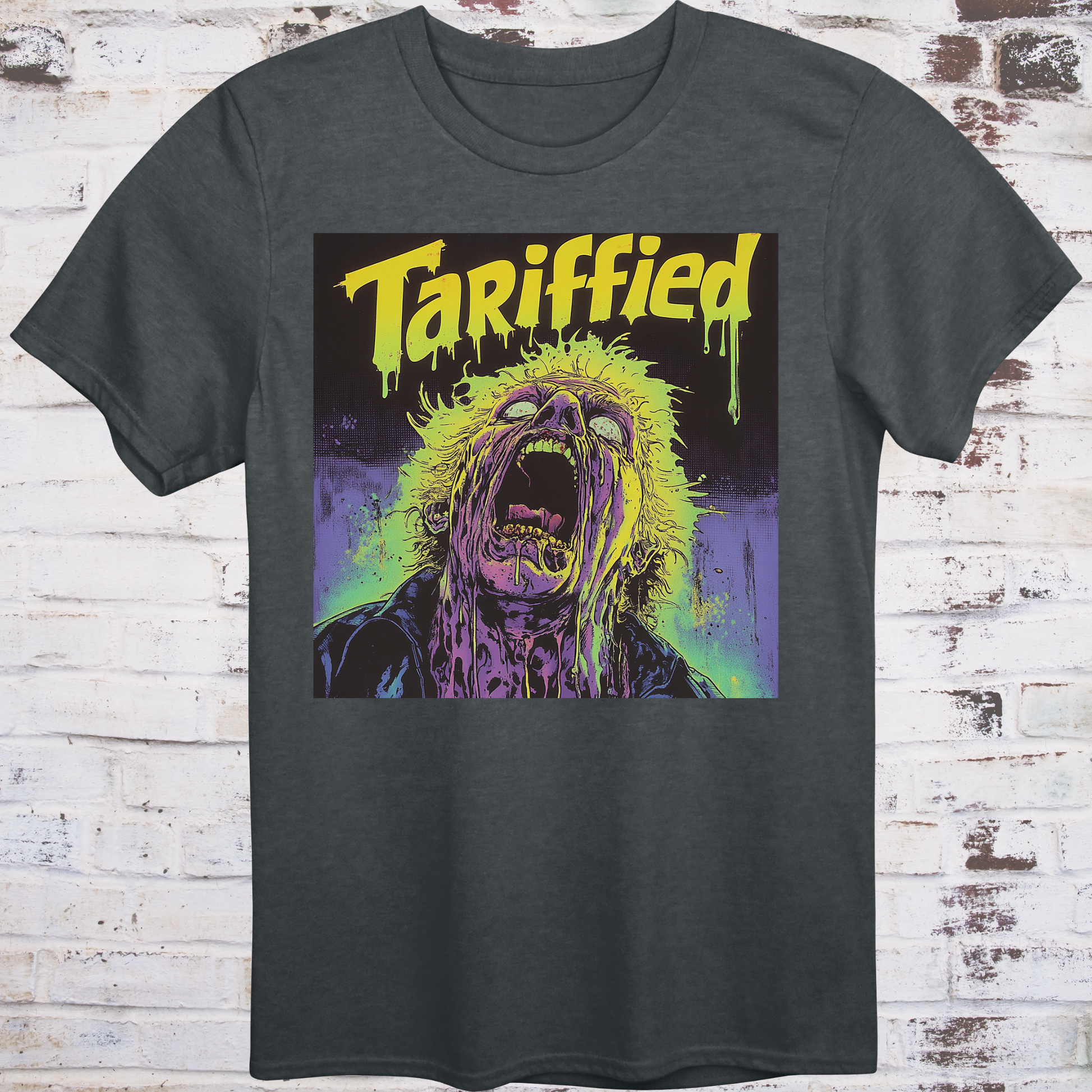Gray t-shirt featuring a neon horror comic-style illustration  
of a screaming figure melting in slime with text “Tariffied” –  
anti-Trump parody shirt by Democratee’s