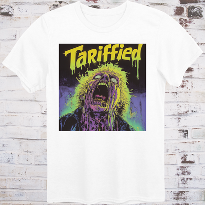 White t-shirt featuring a neon horror comic-style illustration  
of a screaming figure melting in slime with text “Tariffied” –  
anti-Trump parody shirt by Democratee’s