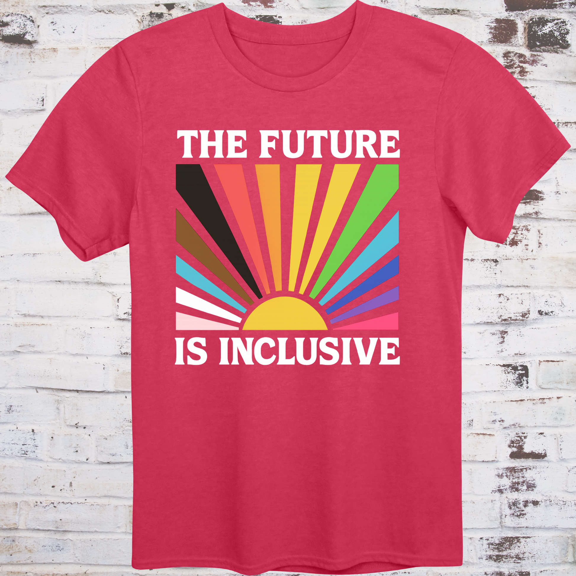 Red t-shirt with retro-style sunburst in progress pride flag colors  
and bold white text reading "The Future Is Inclusive" –  
intersectional activist shirt by Democratee’s