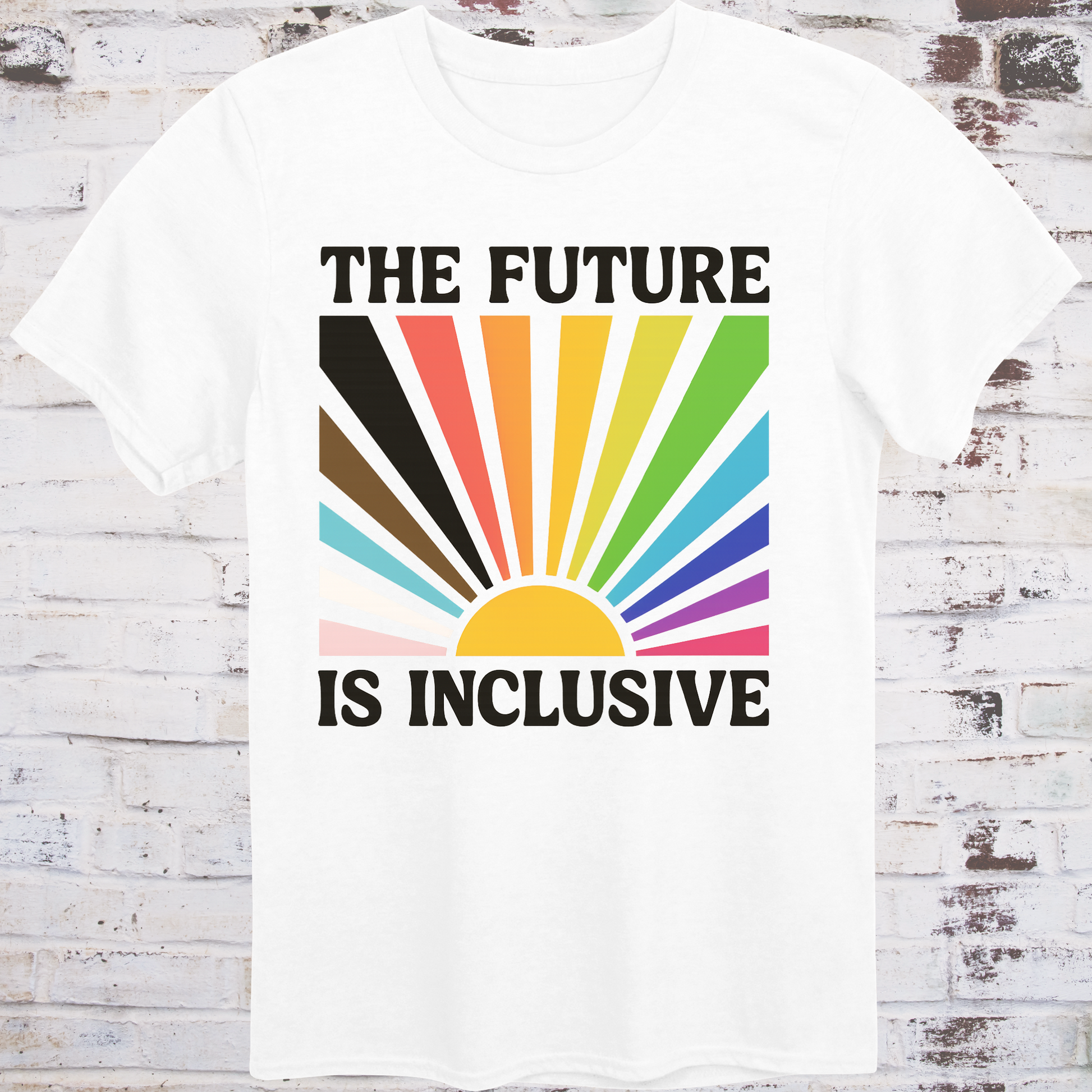 White t-shirt with retro-style sunburst in progress pride flag colors  
and bold white text reading "The Future Is Inclusive" –  
intersectional activist shirt by Democratee’s