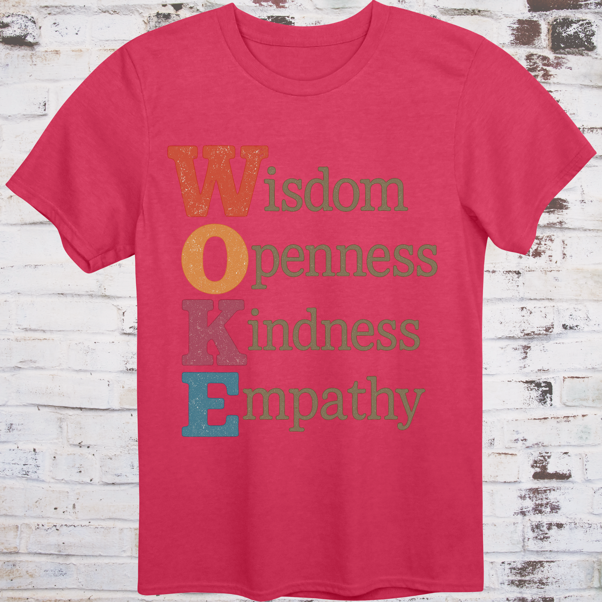 Red t-shirt with bold vertical WOKE acronym in colorful letters,  
spelling out Wisdom, Openness, Kindness, and Empathy –  
reclaimed progressive shirt by Democratee’s