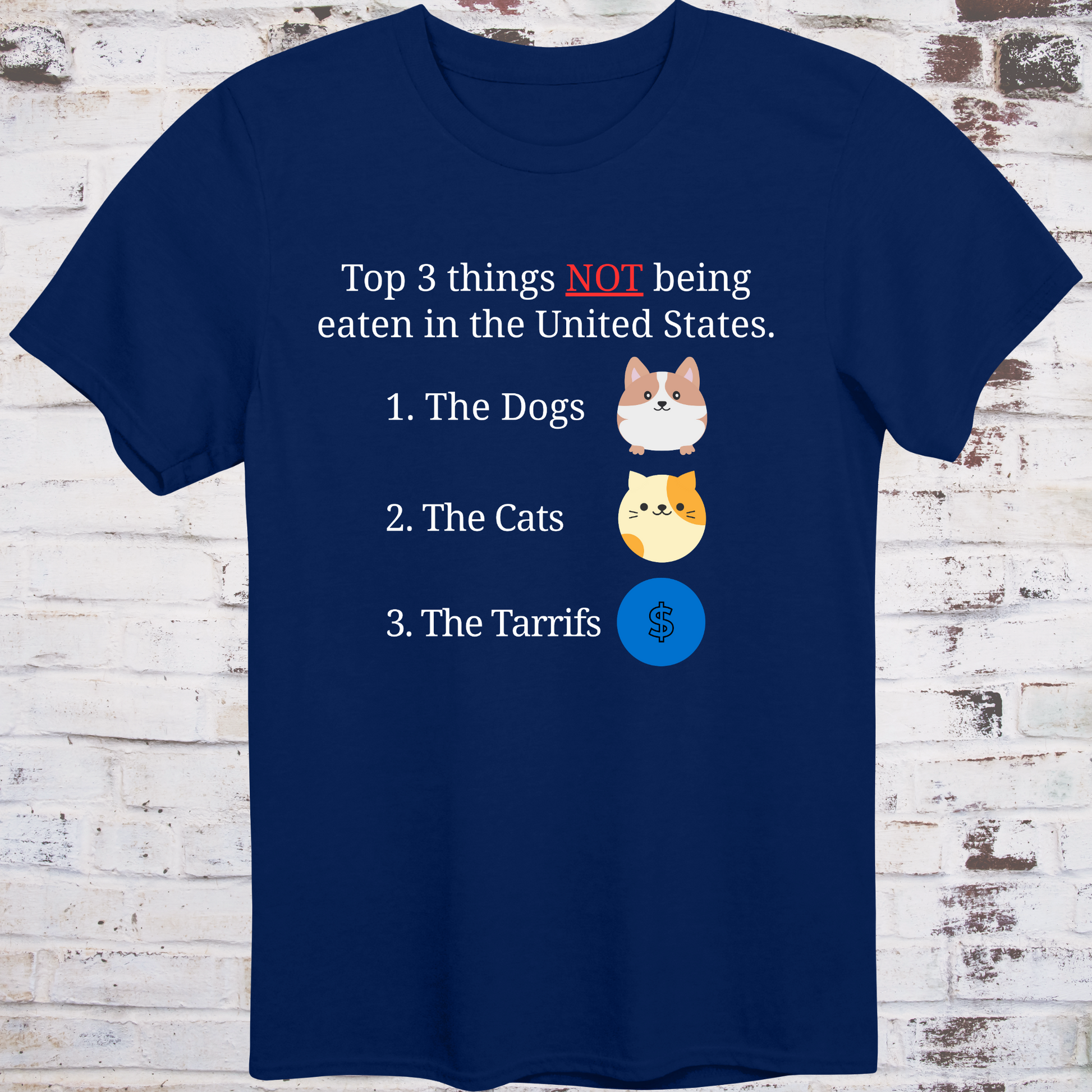Navy t-shirt with cartoon icons of a dog, a cat, and a dollar sign  
next to text listing “Top 3 Things NOT Being Eaten in the United States” –  
funny political parody shirt by Democratee’s