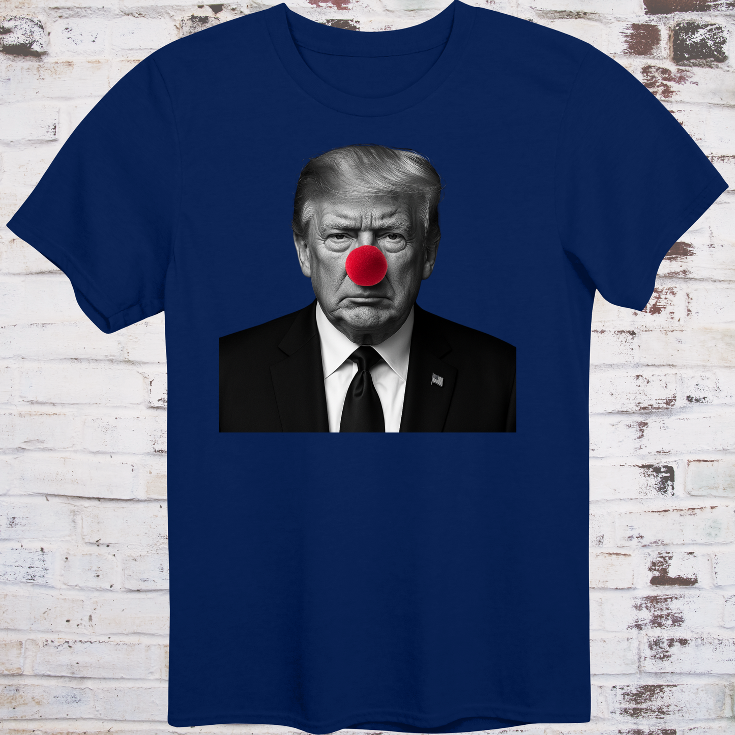 Navy t-shirt with black-and-white photo of Donald Trump wearing a red clown nose –  
minimalist parody protest shirt by Democratee’s