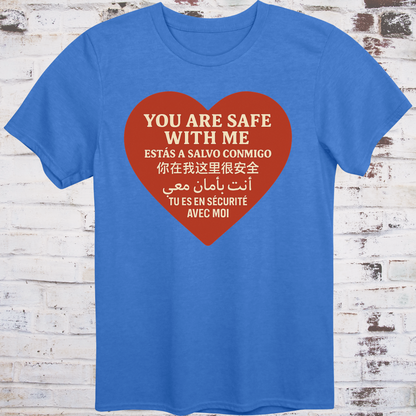Blue T-shirt with heart graphic reading “You Are Safe With Me” in six languages including English, Spanish, Chinese, Arabic, and French