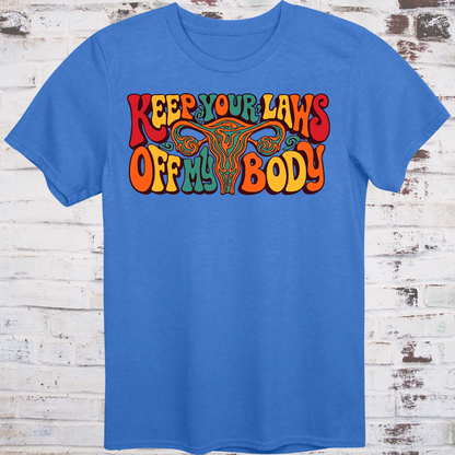 Keep Your Laws Off My Body in massive interlocking 70s bubble letters in deep red, teal, and orange around a stylized uterus, on a warm mustard yellow background.