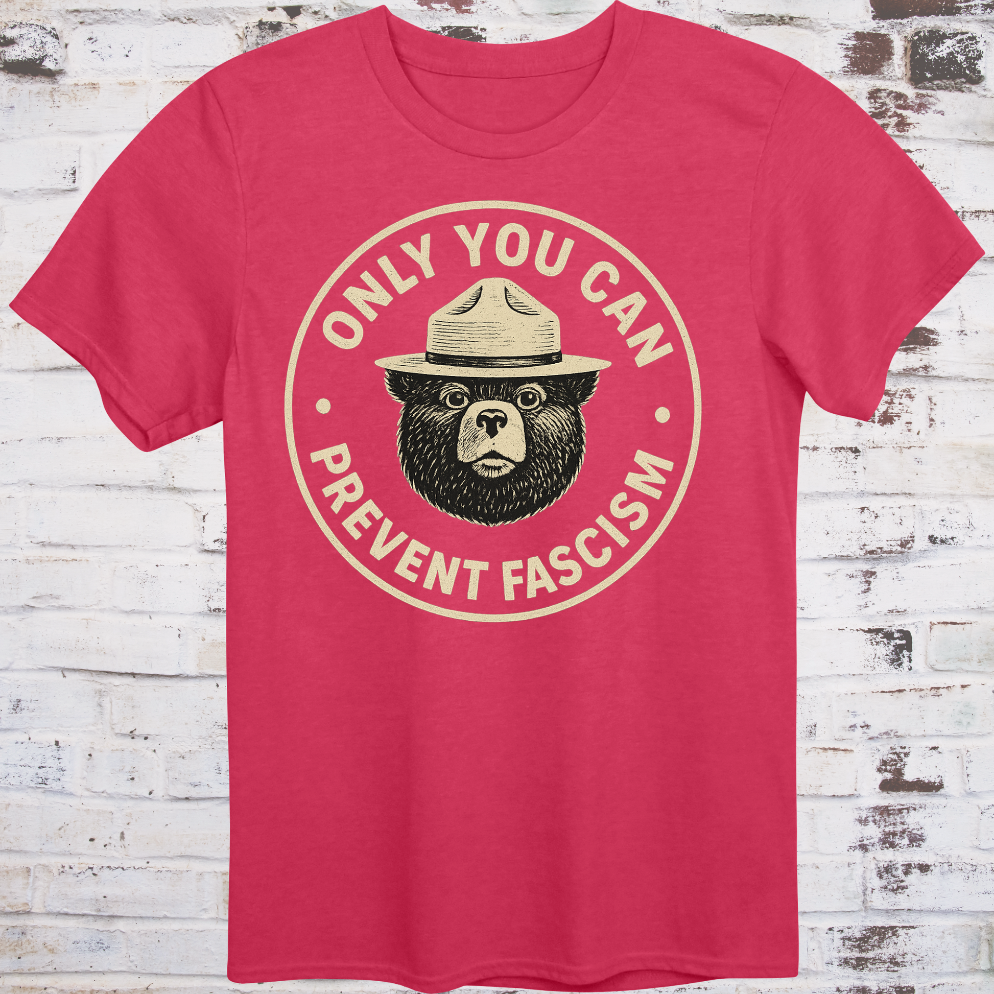 Vintage-style design of a serious bear in a ranger hat with text "Only You Can Prevent Fascism"