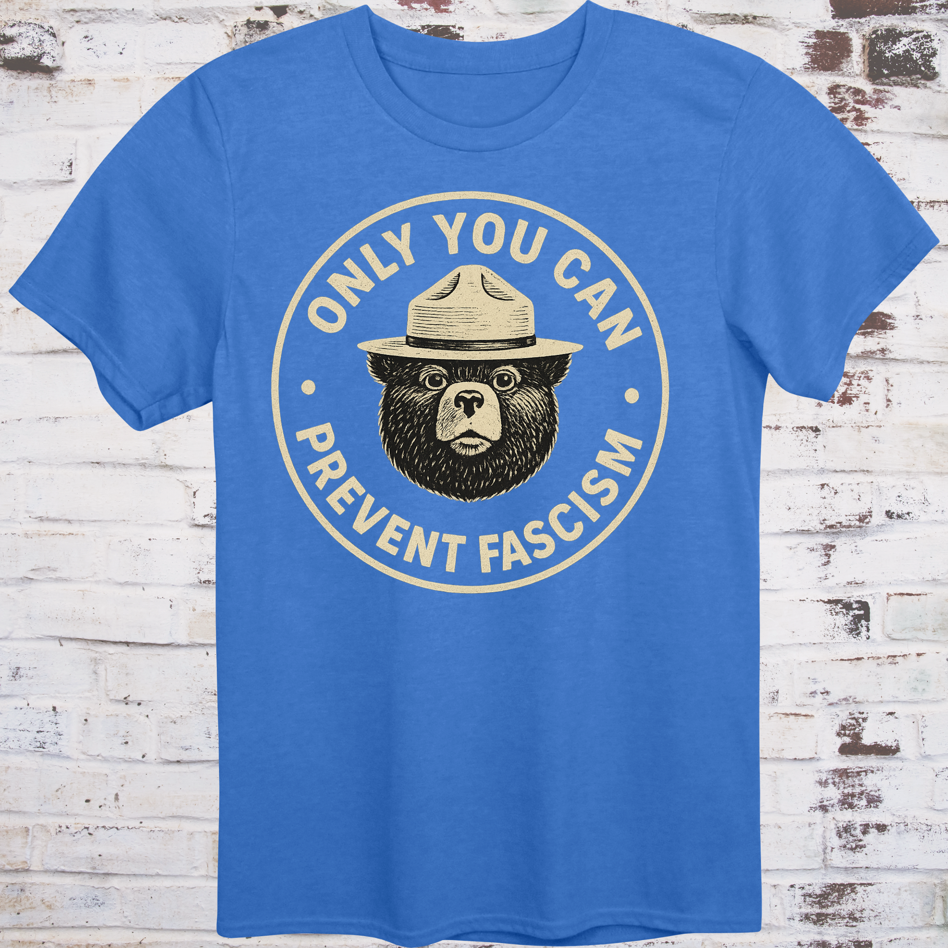 Vintage-style design of a serious bear in a ranger hat with text "Only You Can Prevent Fascism"