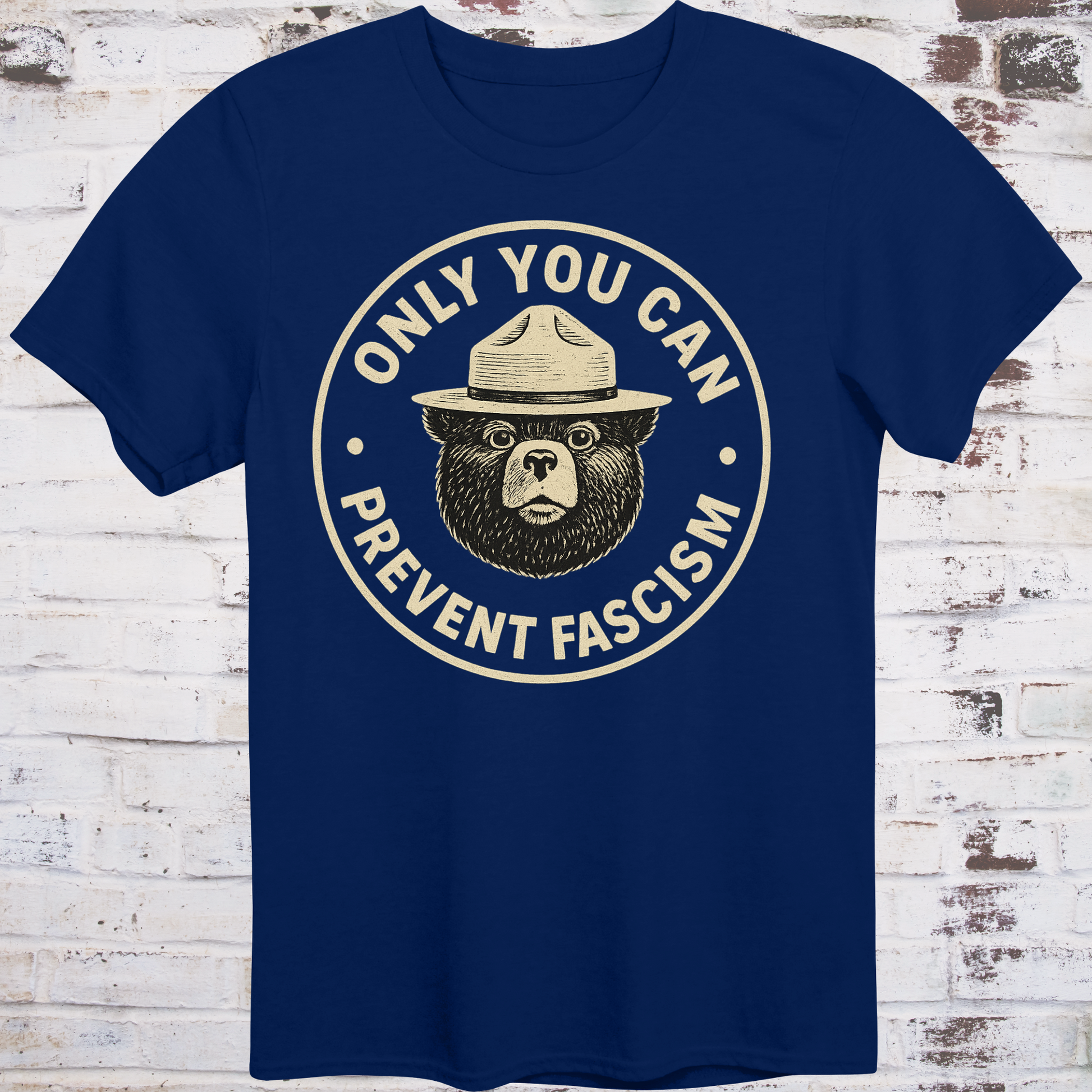 Vintage-style design of a serious bear in a ranger hat with text "Only You Can Prevent Fascism"