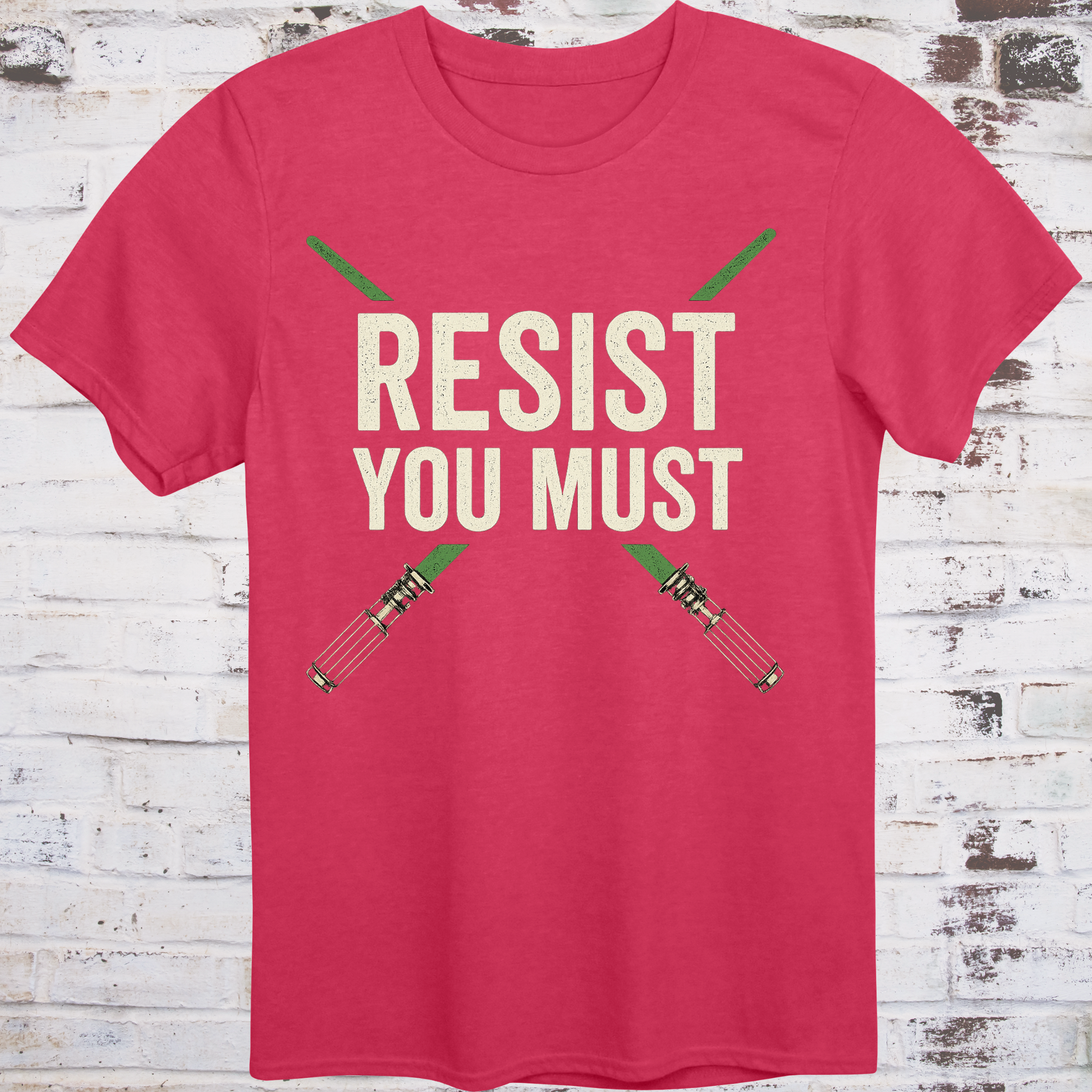 Sci-fi protest tee with green lightsabers and bold block text: “Resist You Must”