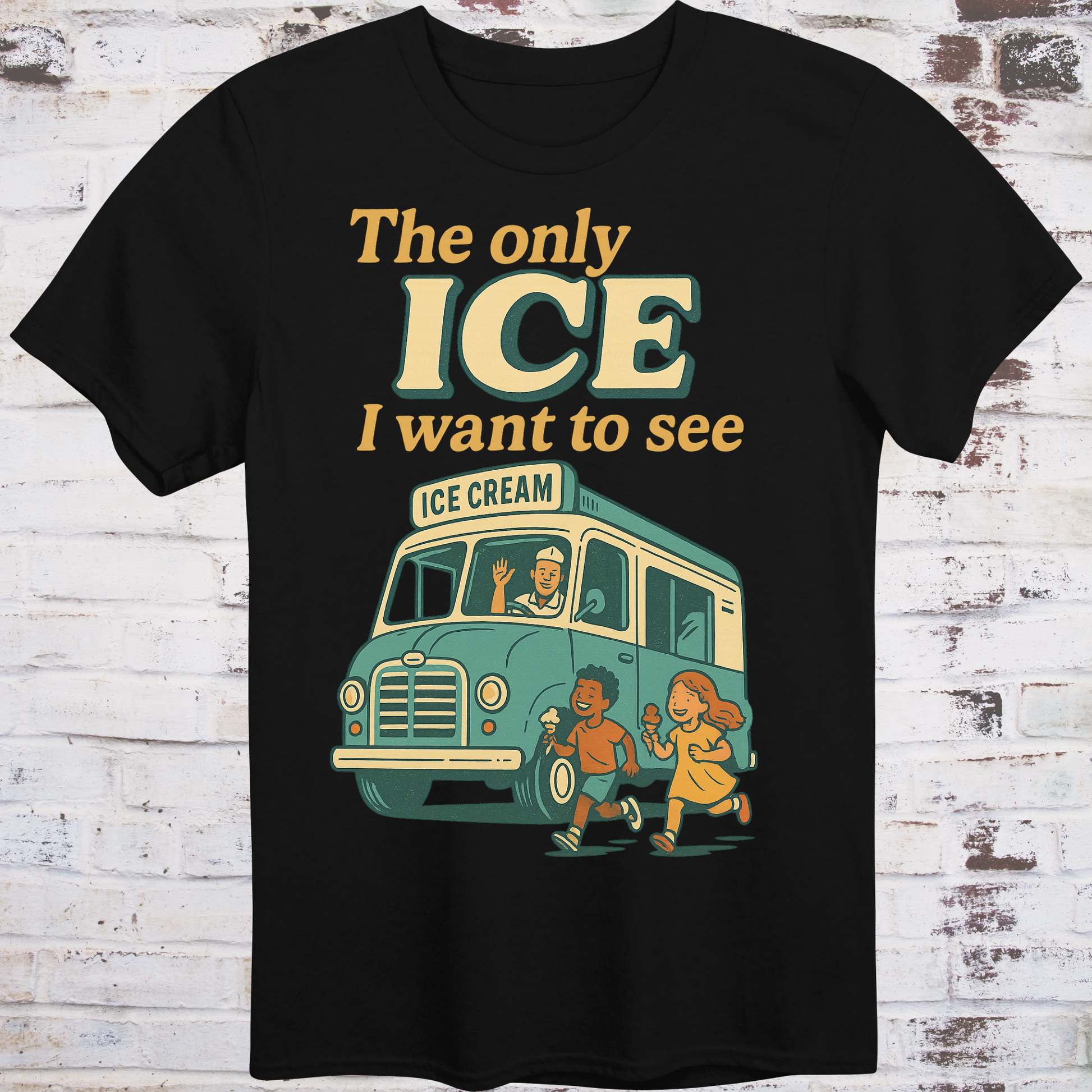 Black t-shirt with an ice cream truck graphic and text on a wooden background
