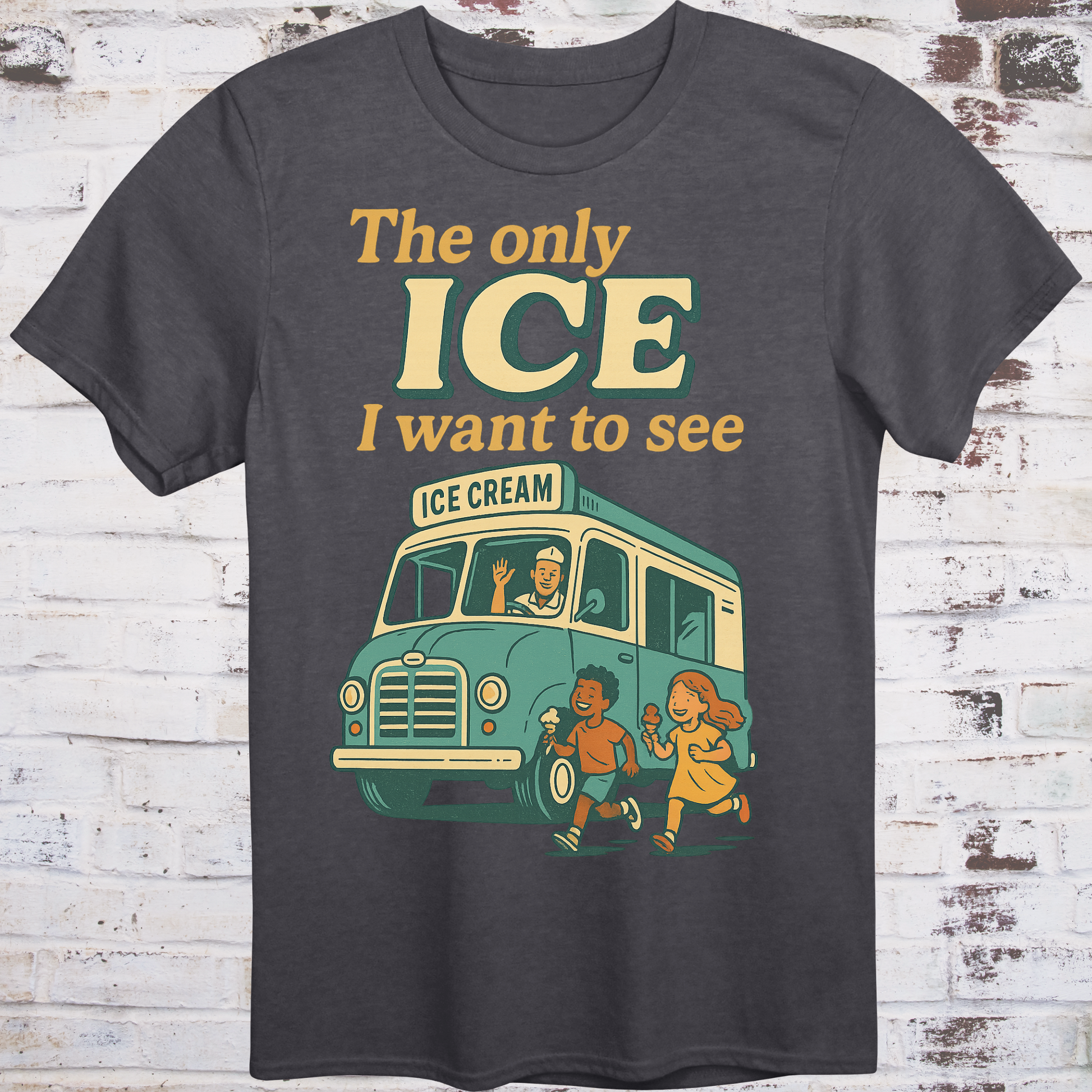 Gray t-shirt with an ice cream truck graphic and text on a wooden background